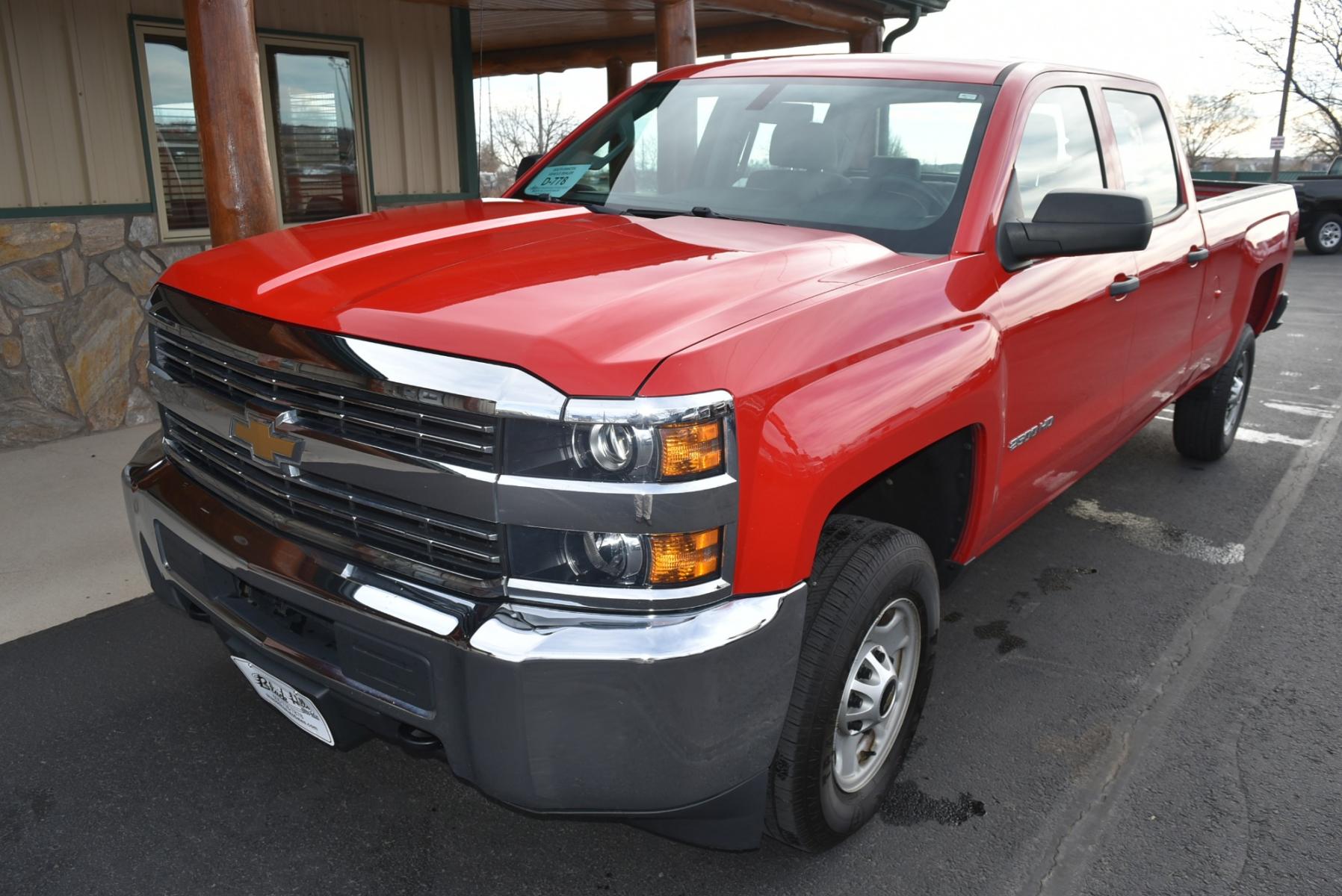2015 Red /Gray Chevrolet Silverado 2500 HD (1GC1KUEG2FF) with an 6.0L Vortec V8 Varaible Valve Timing SFI engine, 6-Speed Automatic Heavy-Duty, Electronically Controlled transmission, located at 1600 E Hwy 44, Rapid City, SD, 57703, (605) 716-7878, 44.070232, -103.171410 - Photo #2